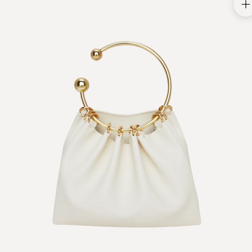 Verafied cream ring handle bag. Brand new